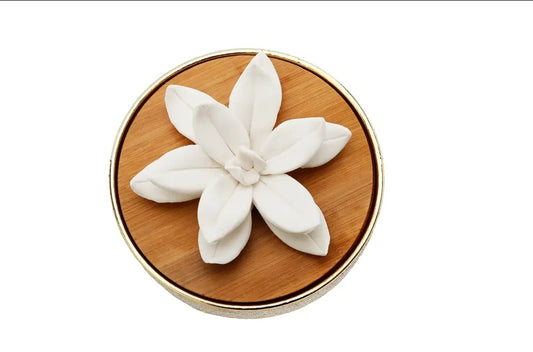 Gold Hemispheric Shaped Diffuser With White Flower